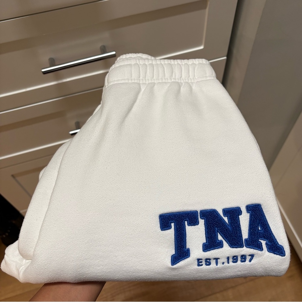 TNA White Sweat Joggers with Blue Embroidery